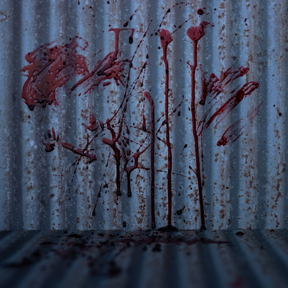 Photography set of corrugated metal with blood spatters